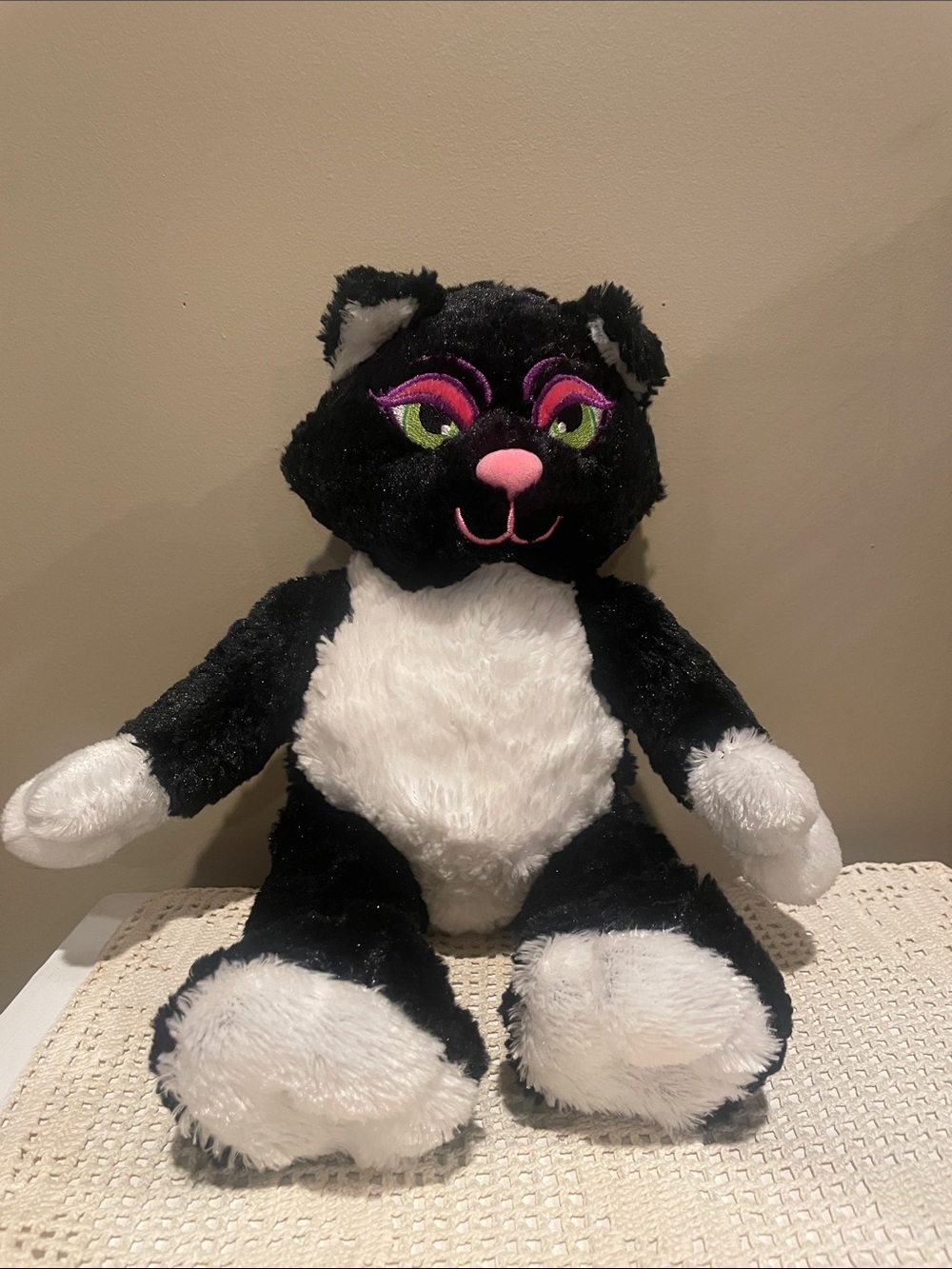 Black and white kitty plush with big bold eyes